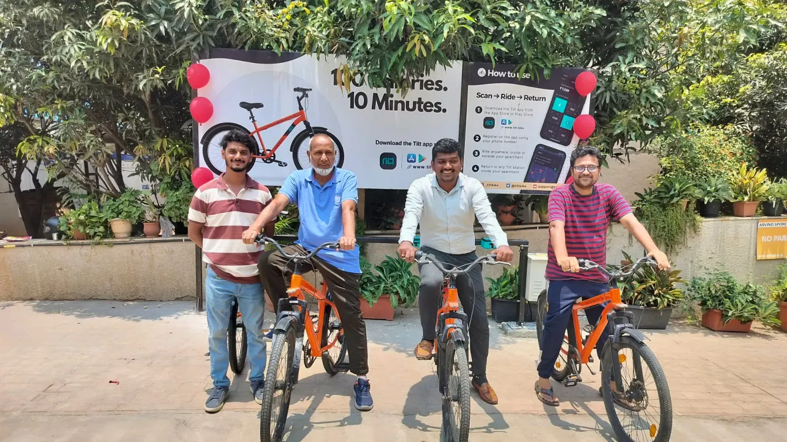 Residents at the launch of a Tilt cycle-sharing station in Arvind Sporcia