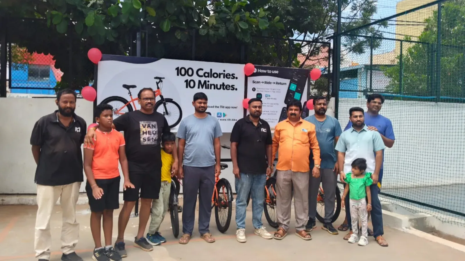 Residents at the launch of a Tilt cycle-sharing station in Ultima Smart Homes