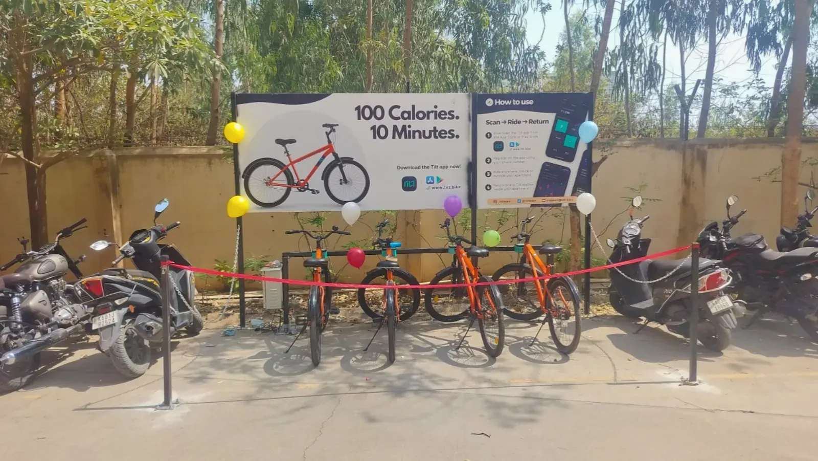 Residents at the launch of a Tilt cycle-sharing station in Vindhyagiri